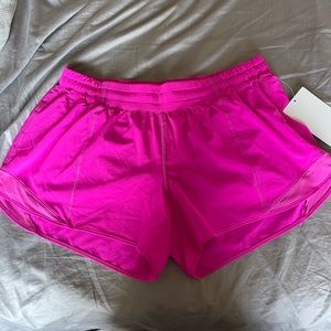 Lululemon hotty hot low rise 4 inch in pow pink new with tags size 14